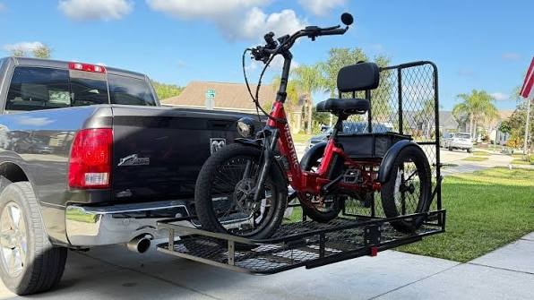 Hitch-mounted bike carrier on the rear of an SUV